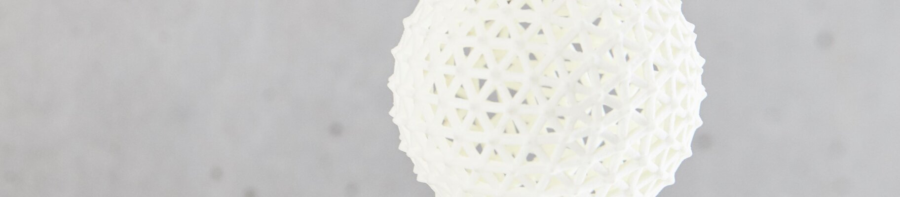 white 3d printed mesh ball